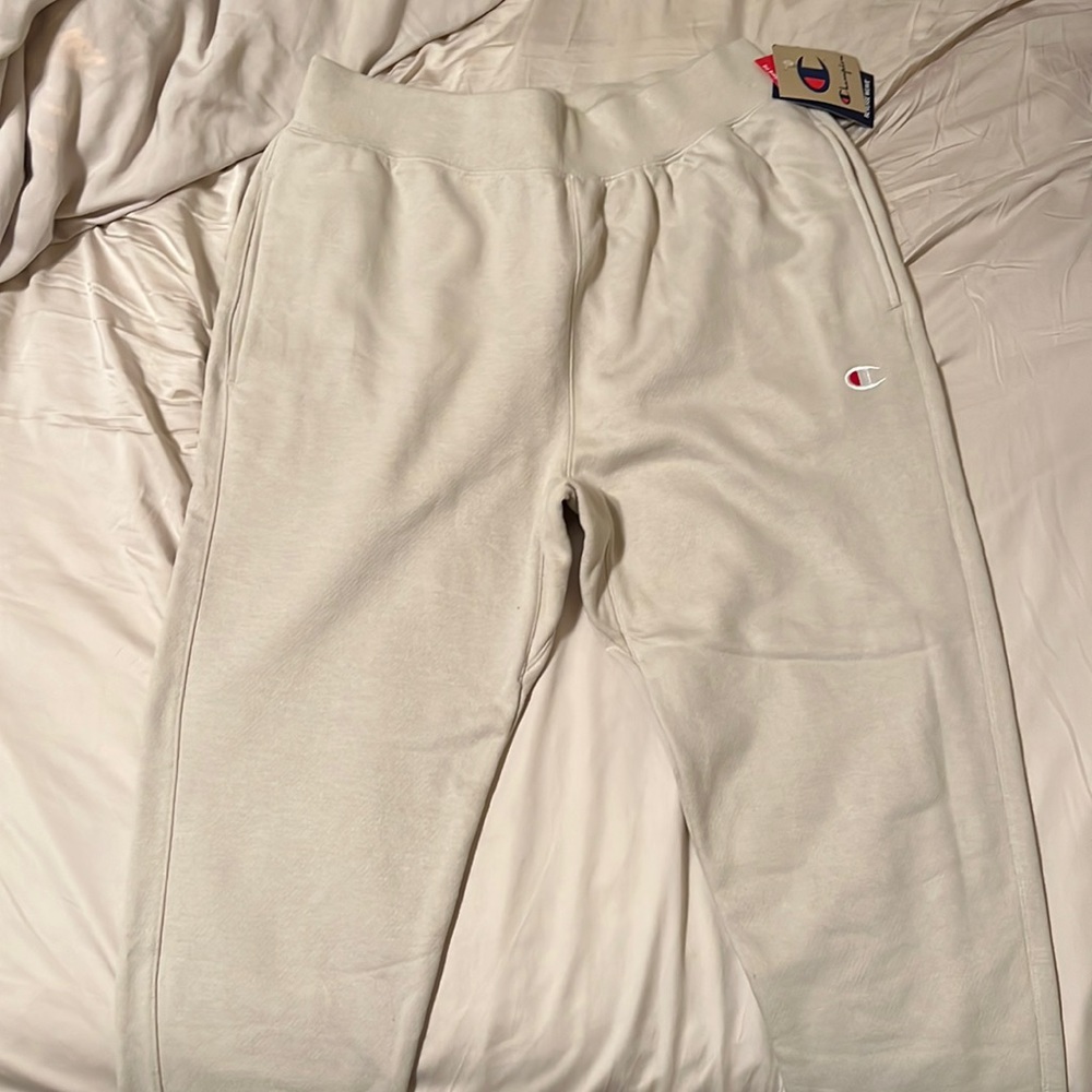 large cream champion sweat pants